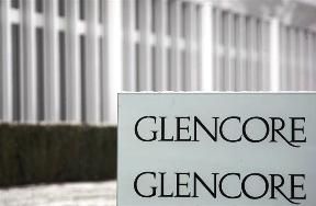 Logos are seen in front of Swiss commodities trader Glencore building in Baar near Zurich