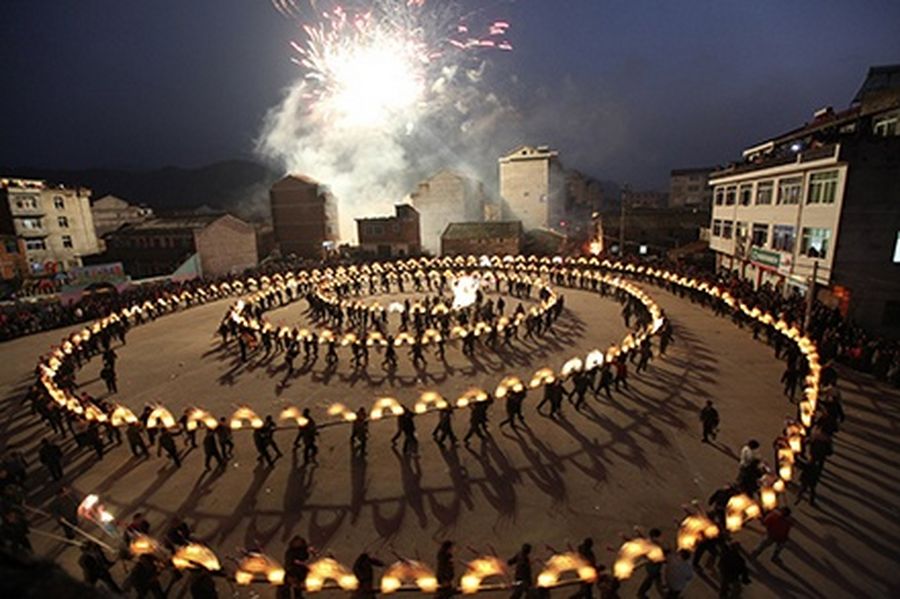 Villagers perform a dragon dance to pray for good luck and celebrate the upcoming Chinese Lantern Festival in Taizhou, Zhejiang.